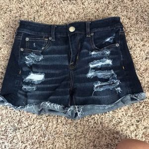 Dark wash destroyed American eagle jean shorts
